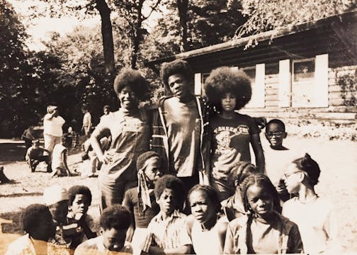 A group of Black youths pose at Camp Katharine Parsons.