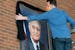 Vice President Walter Mondale’s portrait at the University of Minnesota Law School was draped with a black sash after Mondale’s death in April 202