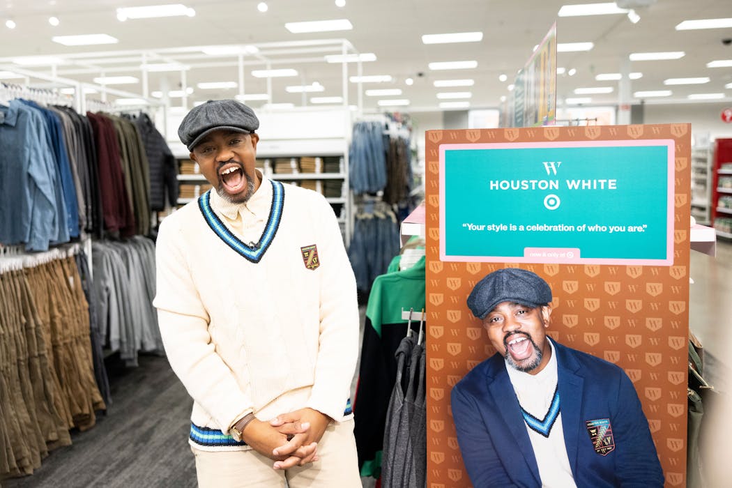 Houston White next to a display of his clothing at the Lake Street Target store in Minneapolis.
