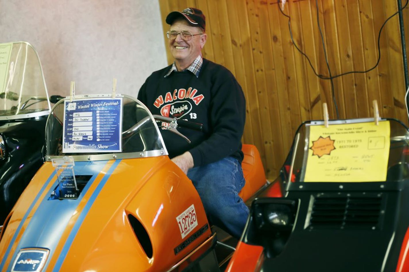 Ron Ebbers has a collection of 100 vintage snowmobiles some of which are stored in a warehouse in Hector Minnesota.