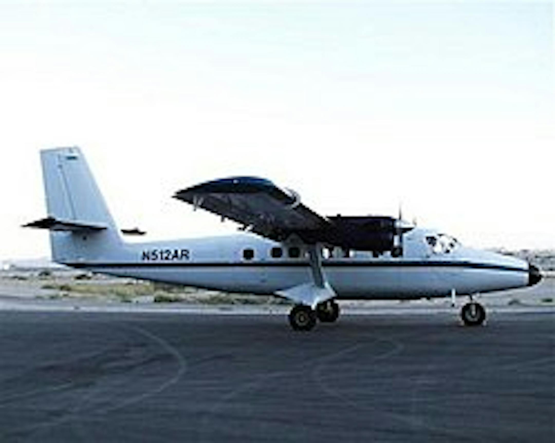File - This image provided by NOAA shows a Aug. 10, 2007 file photo of a DeHavilland DHC6 Twin Otter similar to the one belonging to Merpati Nusantari airline that has gone missing over Indonesia's Papua region early Sunday Aug. 2, 2009. Merpati Nusantari airline director of operations Capt. Nikmatullah says the Twin Otter plane was on a regular flight Sunday when it lost contact with officials on the ground. (AP Photo/NOAA, File)