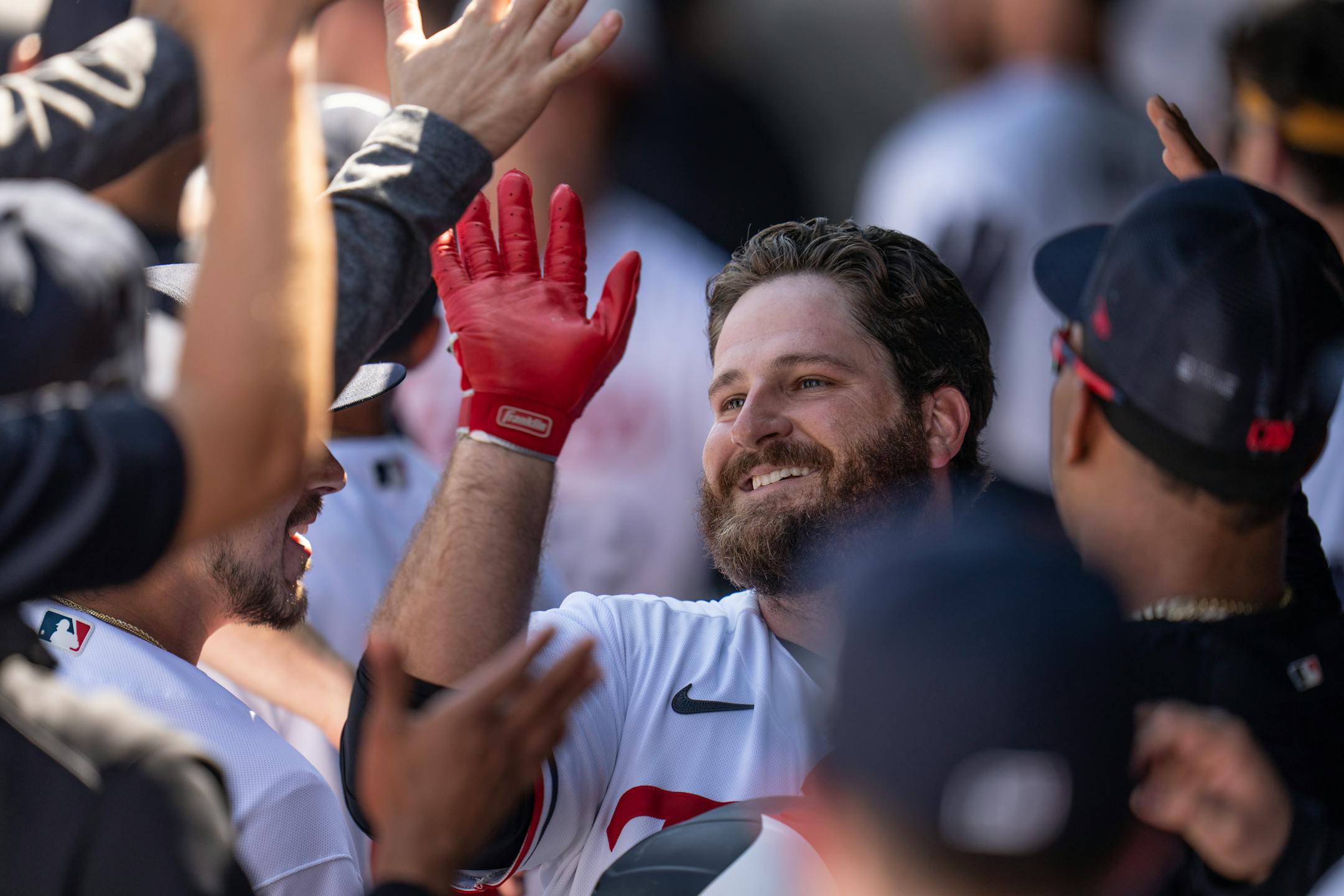 Minnesota Twins first baseman Tyler White (16) celebrates his two run home run with teammates in the dugout in the second inning.