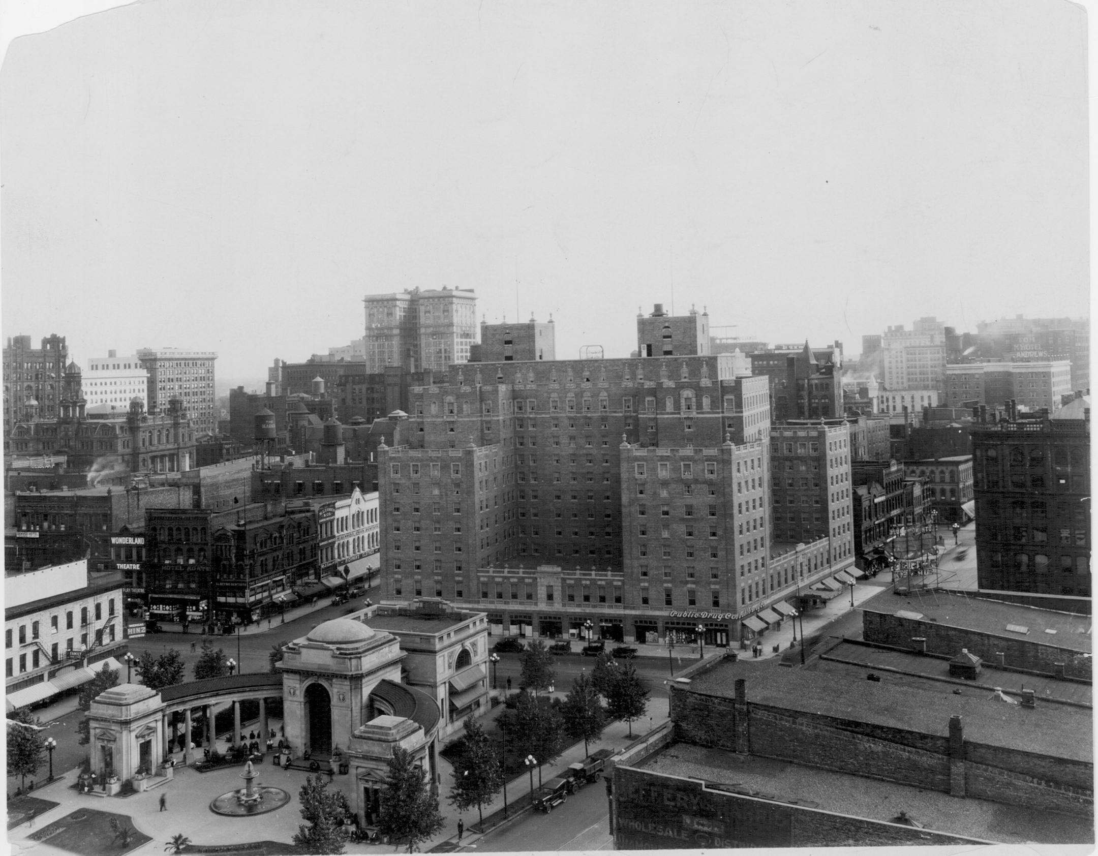Credit: Minneapolis Photo Collection AERIAL VIEW OF GATEWAY PARK AND THE NICOLLET HOTEL LOOKING SOUTH Hotel Andrews is at far right. Drug Company is in the Nicollet Hotel. Other businesses are named left to right and are on Nicollet or Washington Aves. Post Office and Federal Building are the same - with cupolas at left.