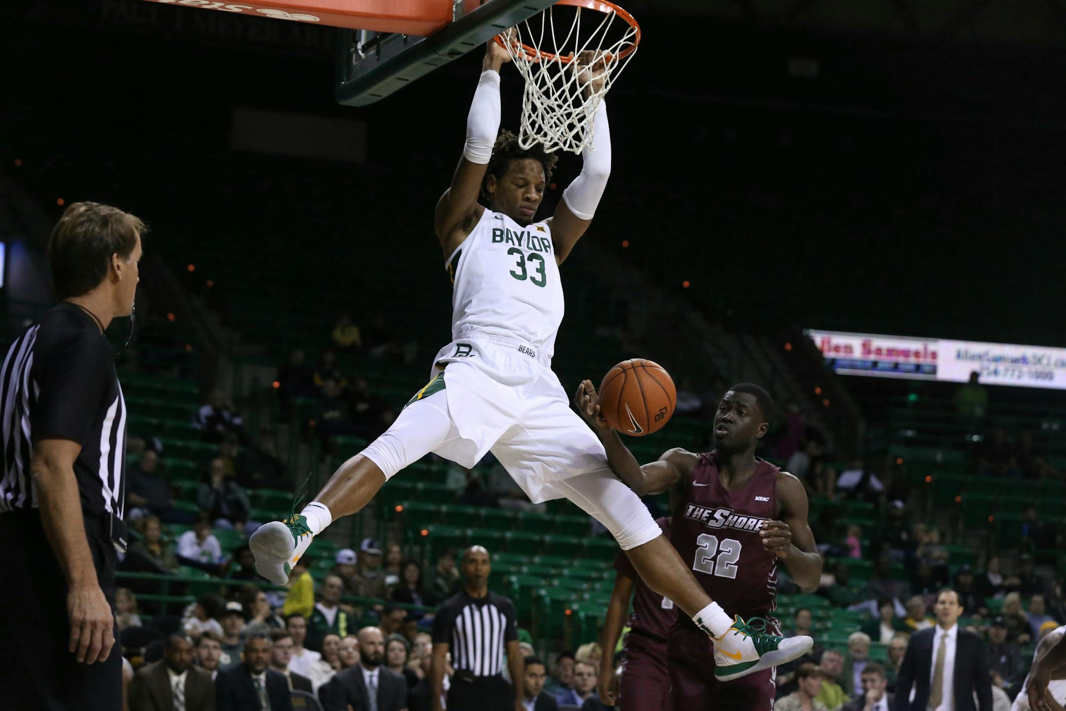 Baylor forward Freddie Gillespie dunks over Maryland-Eastern Shore forward Gabriel Gyamfi on Dec. 3