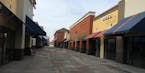 An entire row of stores sits nearly empty in the half-full development called the Promenade, part of the Albertville Premium Outlets. (JOHN EWOLDT)