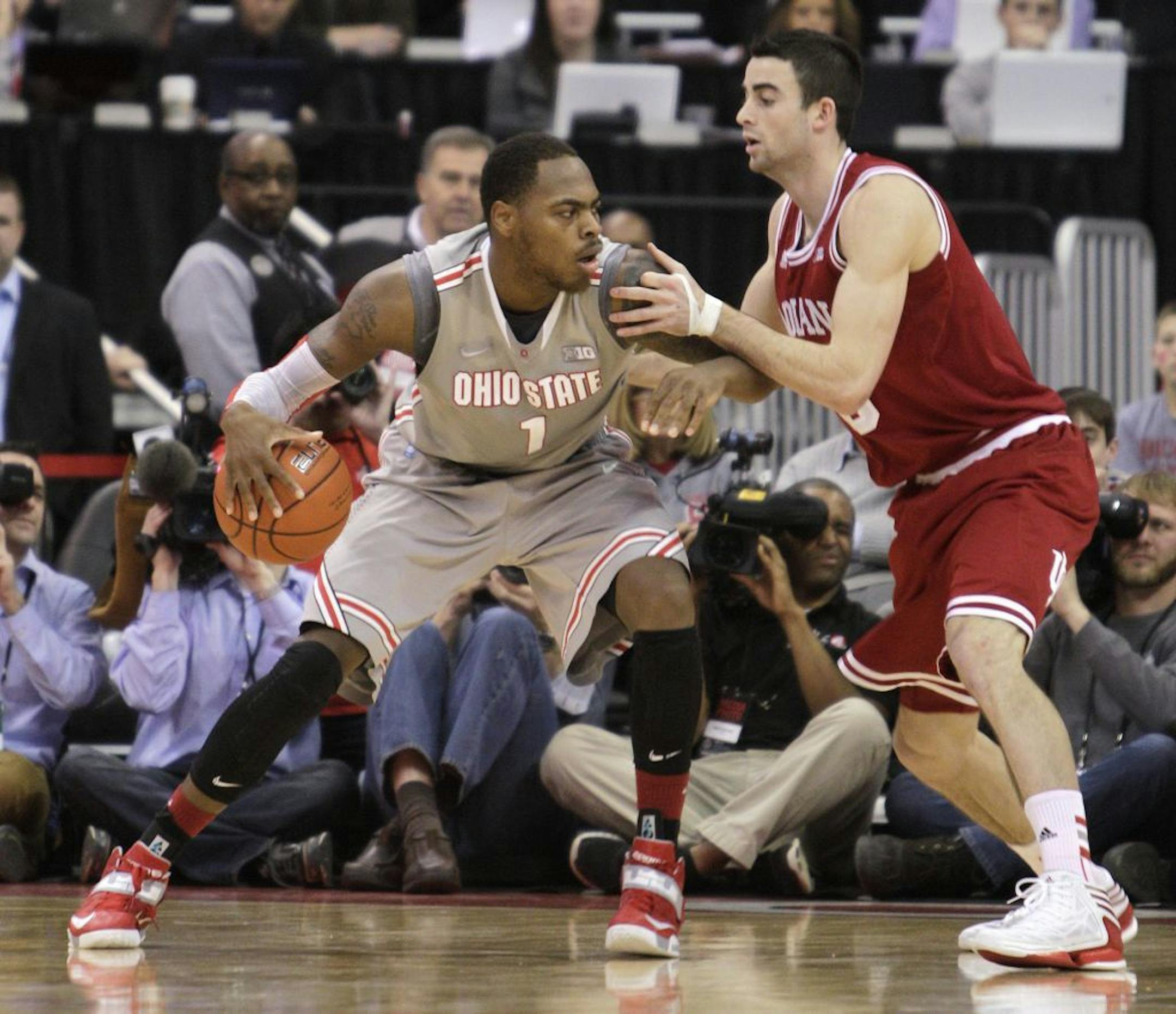 Ohio State's Deshaun Thomas, left.