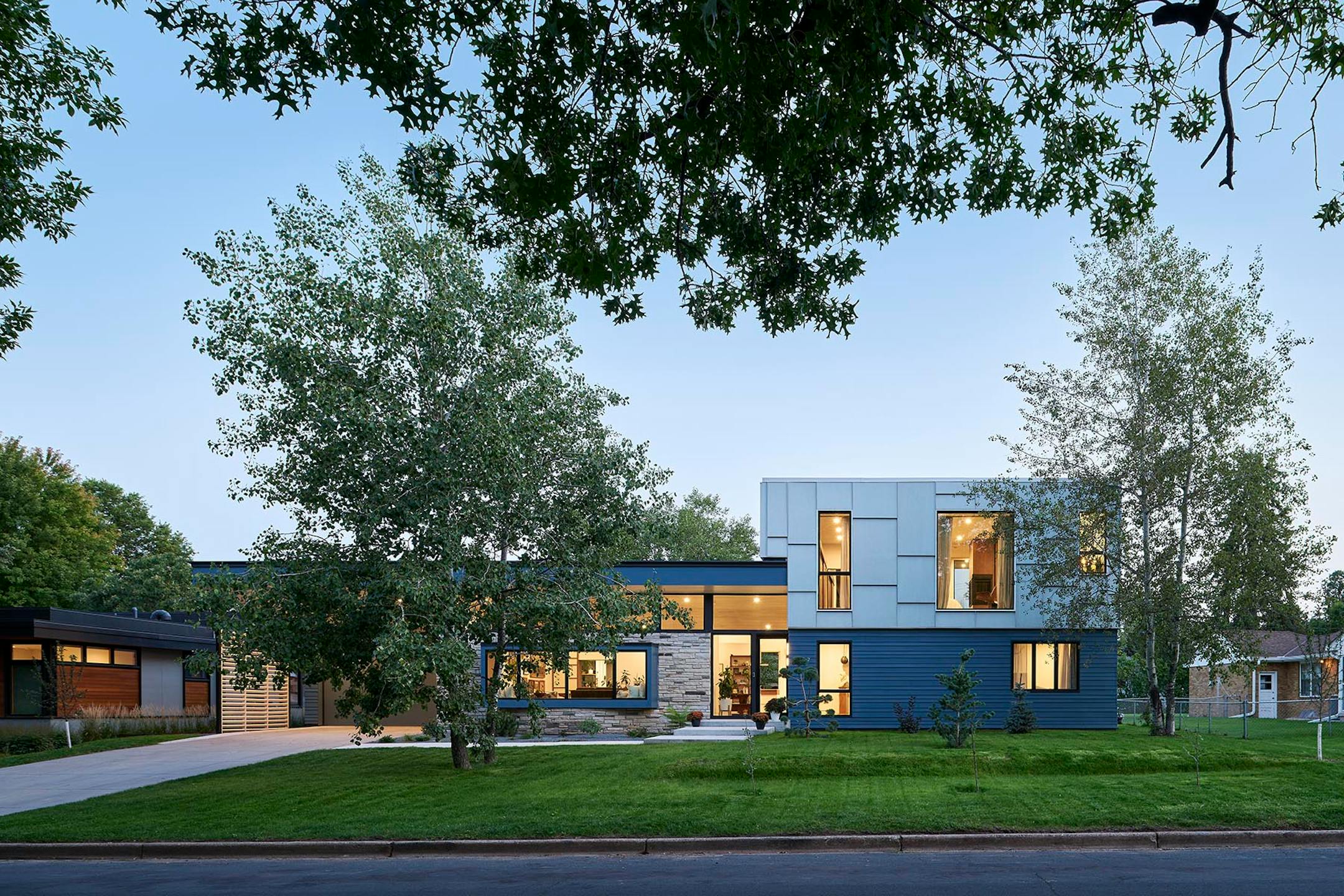 After a fire forced a remodel of a St. Louis Park home, a family hoped for a footprint similar to their original single-story ranch-style house. At the same time, they were game for introducing new, bold and unique materials and design features such as soaring rooflines and transom windows that allow light to come in and display the family's vast plant collection like never before.