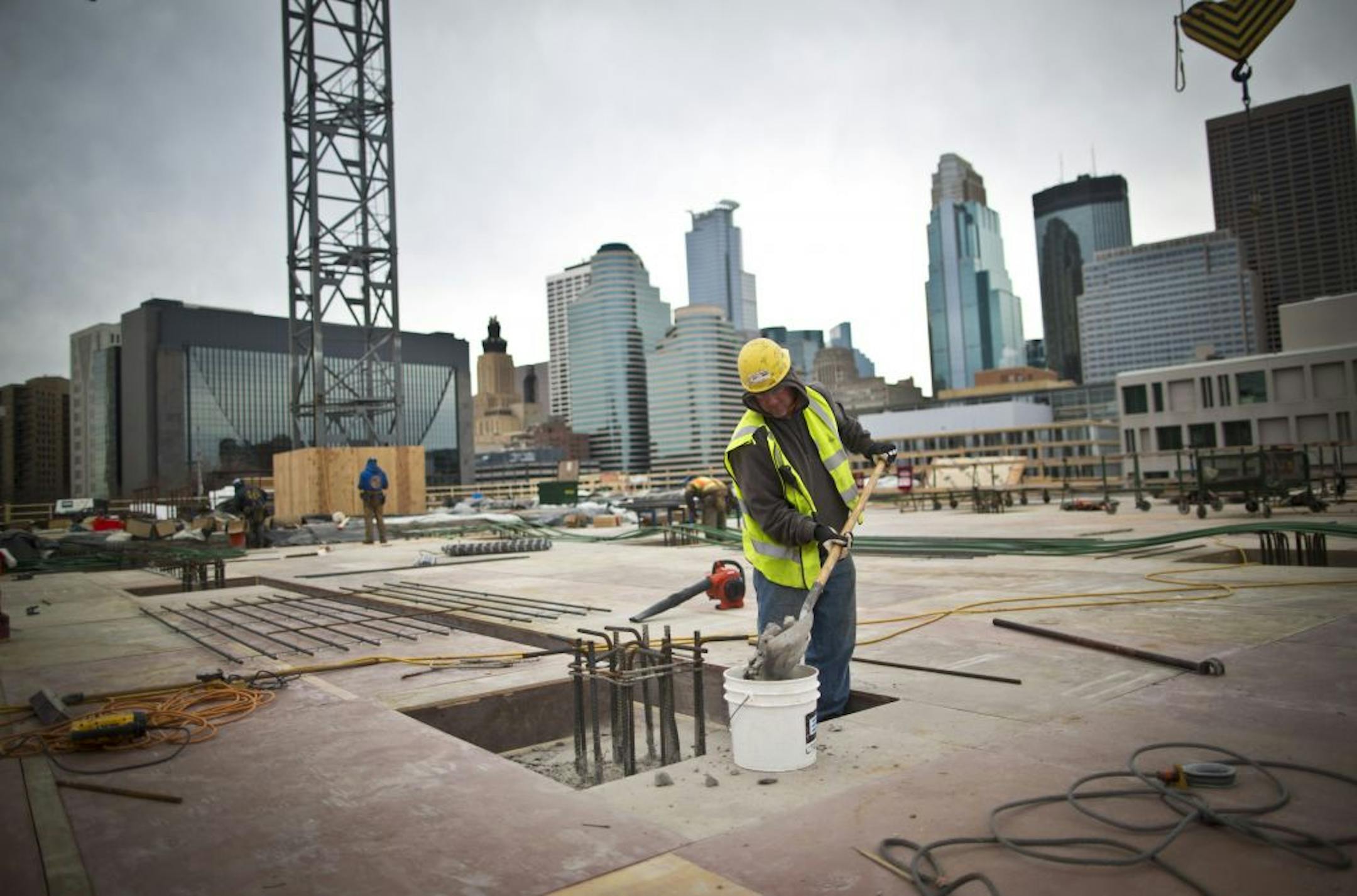 Bart Sladky worked on the construction of a Whole Foods grocery store, which will anchor 286 luxury apartments, in downtown Minneapolis, Minn. on Tuesday, November 2, 2012.