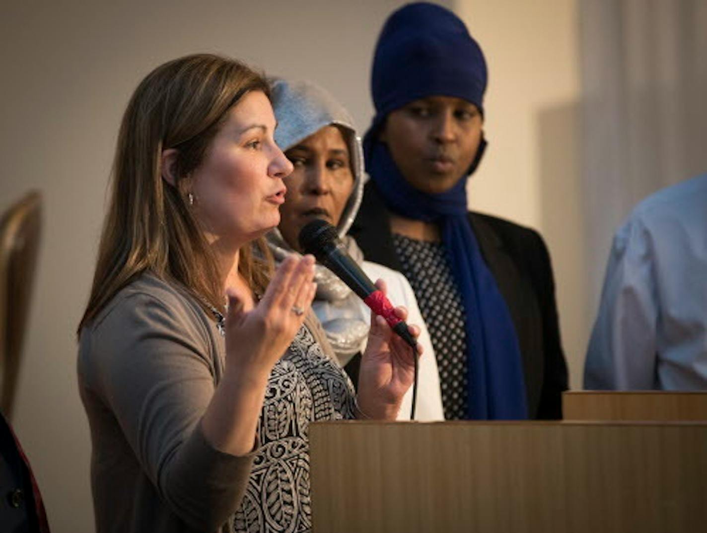 FILE - Rep. Mary Franson spoke during a community FGM (female genital mutilation) education awareness meeting in Minneapolis, on Thursday, May 18, 2017. To her right are FGM survivors Fadumo Abdinur (in silver scarf) and Farhio Khalif.