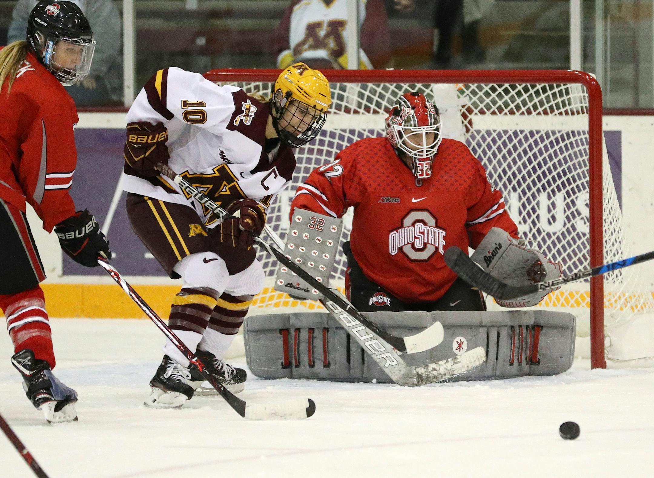 Minnesota Golden Gophers forward Cara Piazza (10) tried to deflect in a shot against Ohio State Buckeyes goaltender Kassidy Sauve (32) in the first period. ] ANTHONY SOUFFLE &#xef; anthony.souffle@startribune.com Game action from an NCAA women's ice hockey match between the Minnesota Golden Gophers and the Ohio State Buckeyes Friday, Oct. 6, 2017 at Ridder Arena in Minneapolis.