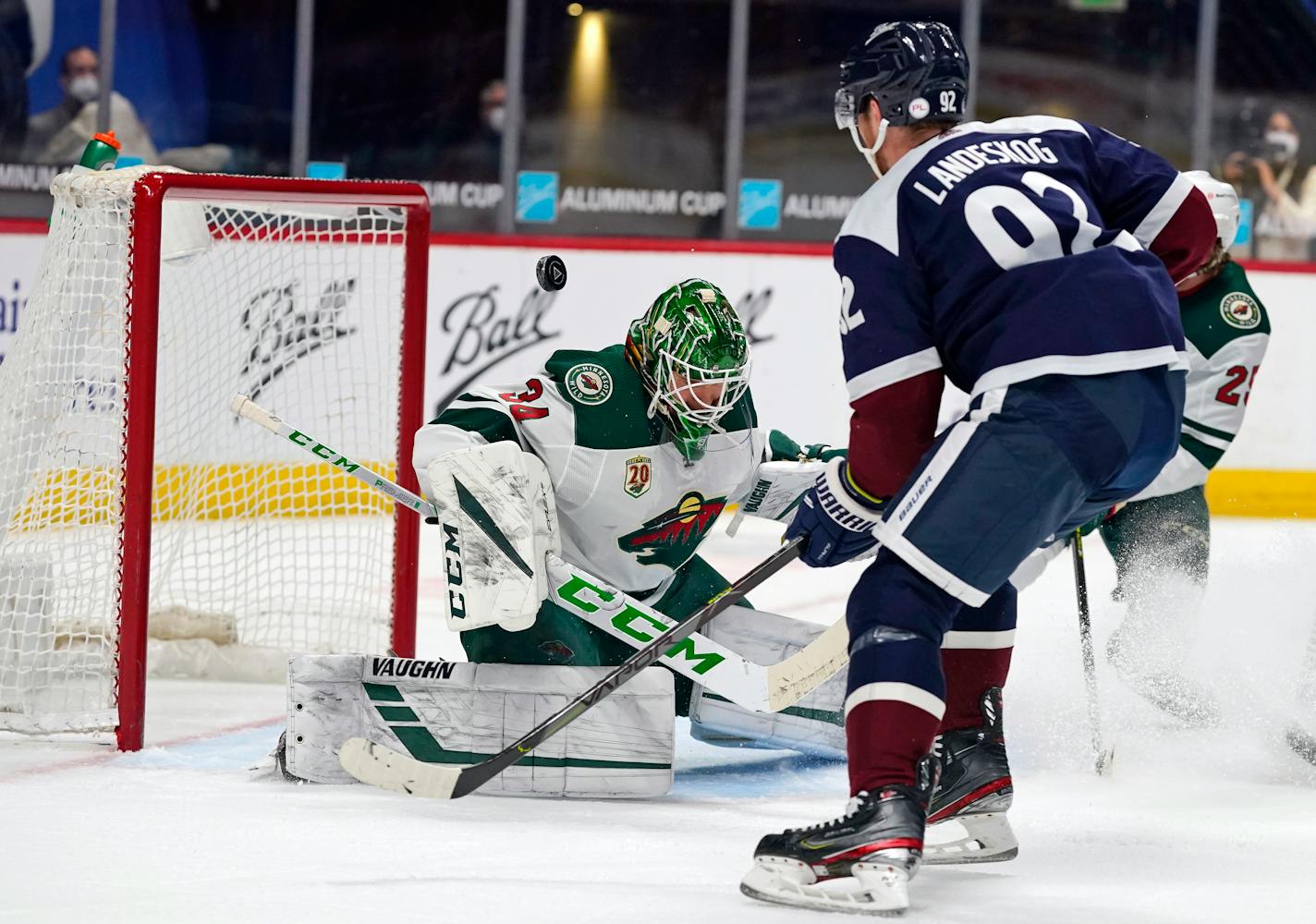 Avalanche left wing Gabriel Landeskog scores a goal against Wild goaltender Kaapo Kahkonen in the first period