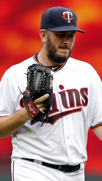 Minnesota Twins pitcher Glen Perkins heads to the mound to pitch for the first time since being on the disabled list for 16 months as he faced the Cle