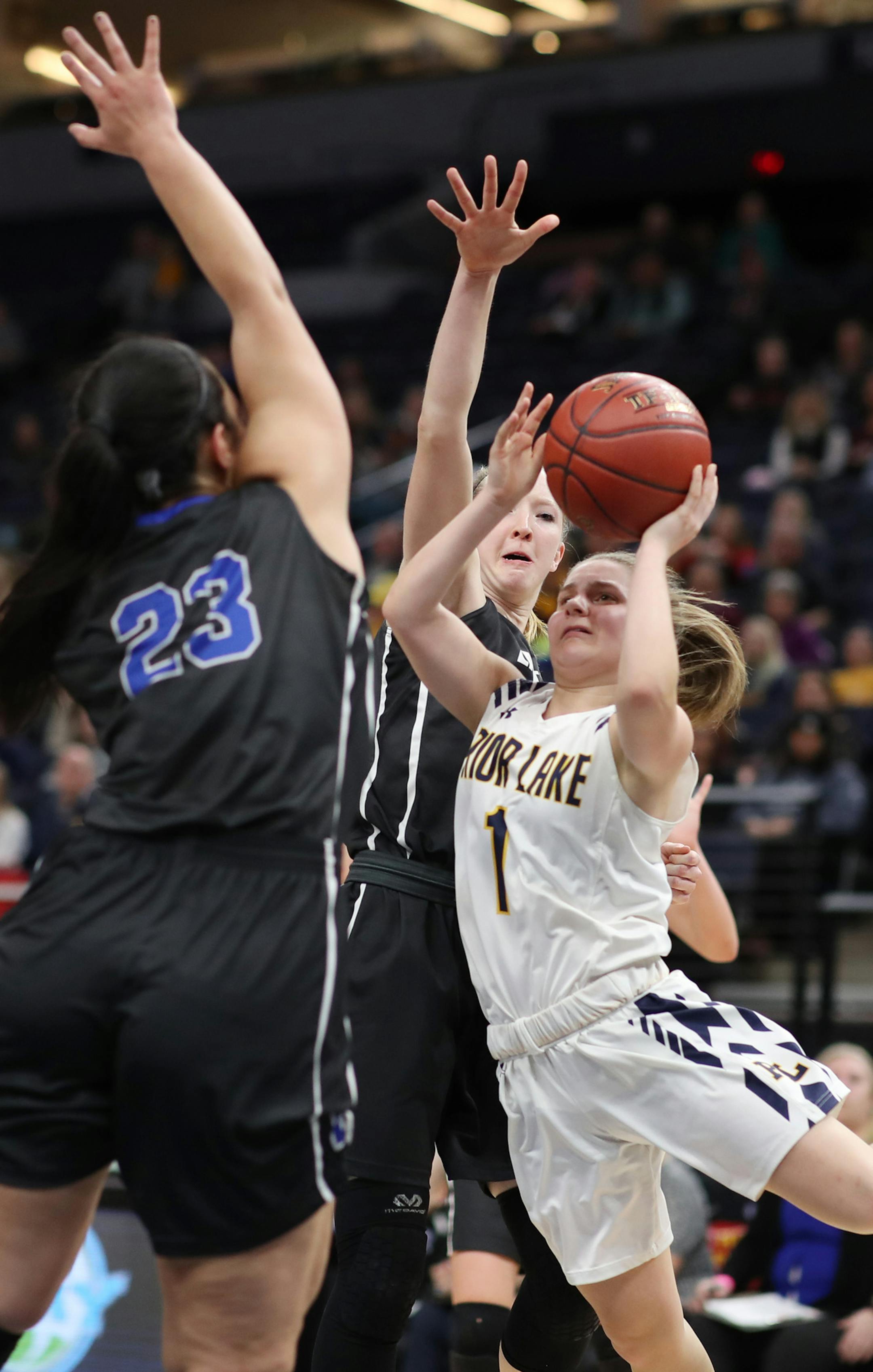 McKenna Hofschild of Eastview shot was blocked by Lauren Carlson during girls class 4A quarter final action at Target Center Wednesday March 14, 2018 in Minneapolis, MN.] The Eastview Lighting played Prior Lake Lakers at Target Center . JERRY HOLT &#xef; jerry.holt@startribune.com
