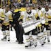 Pittsburgh Penguins' Sidney Crosby (87) celebrates with the Stanley Cup after defeating the Nashville Predators in Game 6 of the NHL hockey Stanley Cu