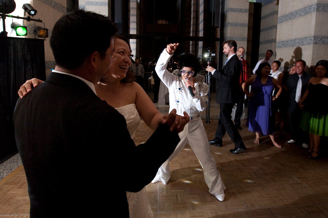Tou Ger Xiong, in his Elvis get-up, serenaded newlyweds Dennis Urabe and Bo Thao-Urabe at their wedding in 2009. 