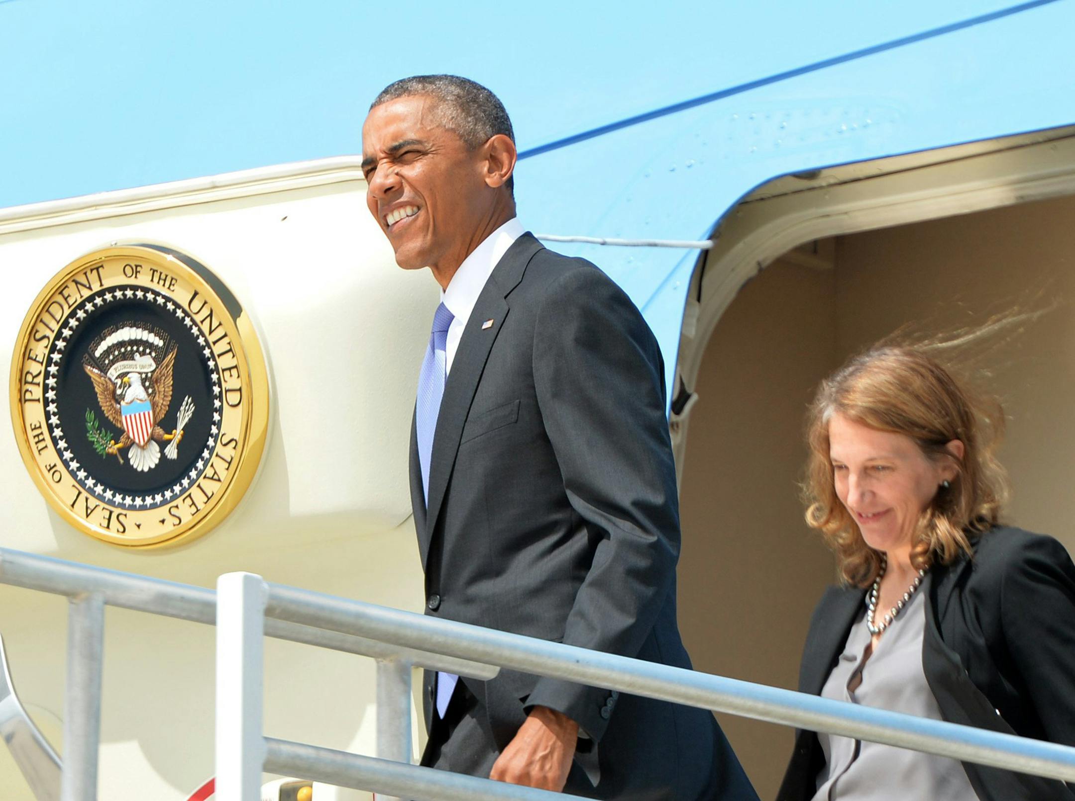 President Barack Obama arrives with Sylvia Burwell, Secretary of Health and Human Services, on Air Force One at Hartsfield-Jackson International Airport to visit the Centers for Disease Control and Prevention to receive a briefing on the outbreak of the Ebola virus in West Africa on Tuesday, Sept. 16, 2014. (Hyosub Shin/Atlanta Journal-Constitution/MCT) ORG XMIT: 1157450