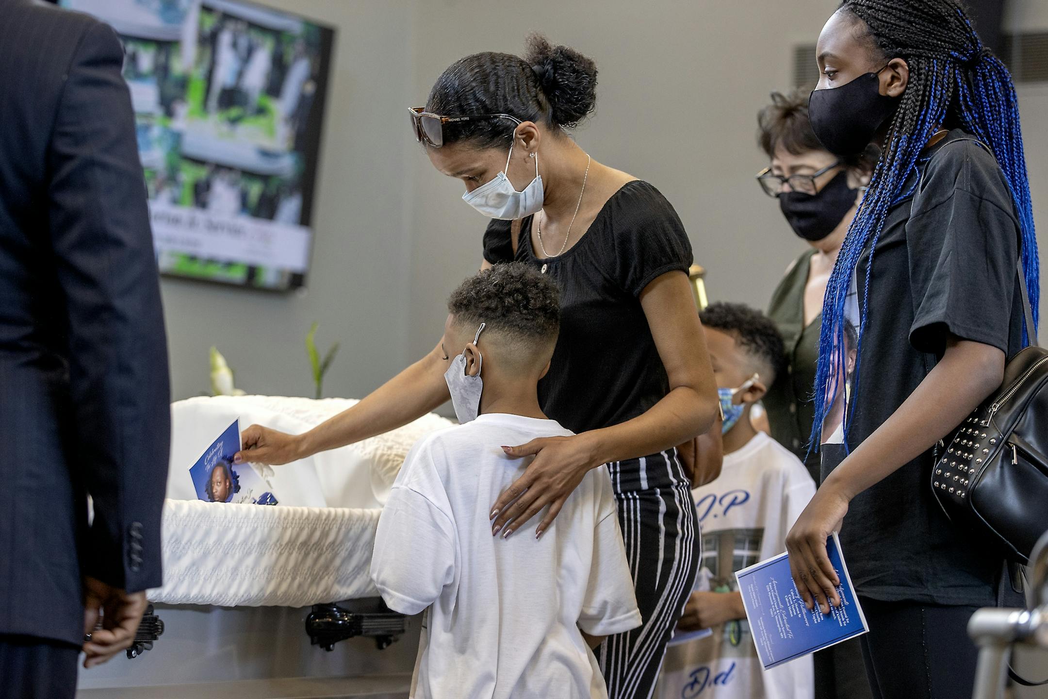 Family and friends of Calvin L. Horton Jr. gathered for his funeral at Estes Funeral Chapel, Friday, June 19, 2020 in Minneapolis, MN. Horton was shot and killed by John Richard Rieple, a pawn broker. Police found Horton lying on the sidewalk in front of the shop near Bloomington and Lake on the second night of civil unrest in the aftermath of the killing of George Floyd at the hands of Minneapolis police.