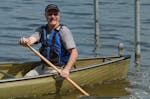 Ted Bell, a 30-year veteran of the paddling industry, showed off one of his newest models. Bell co-founded Northstar Canoes in April 2013.