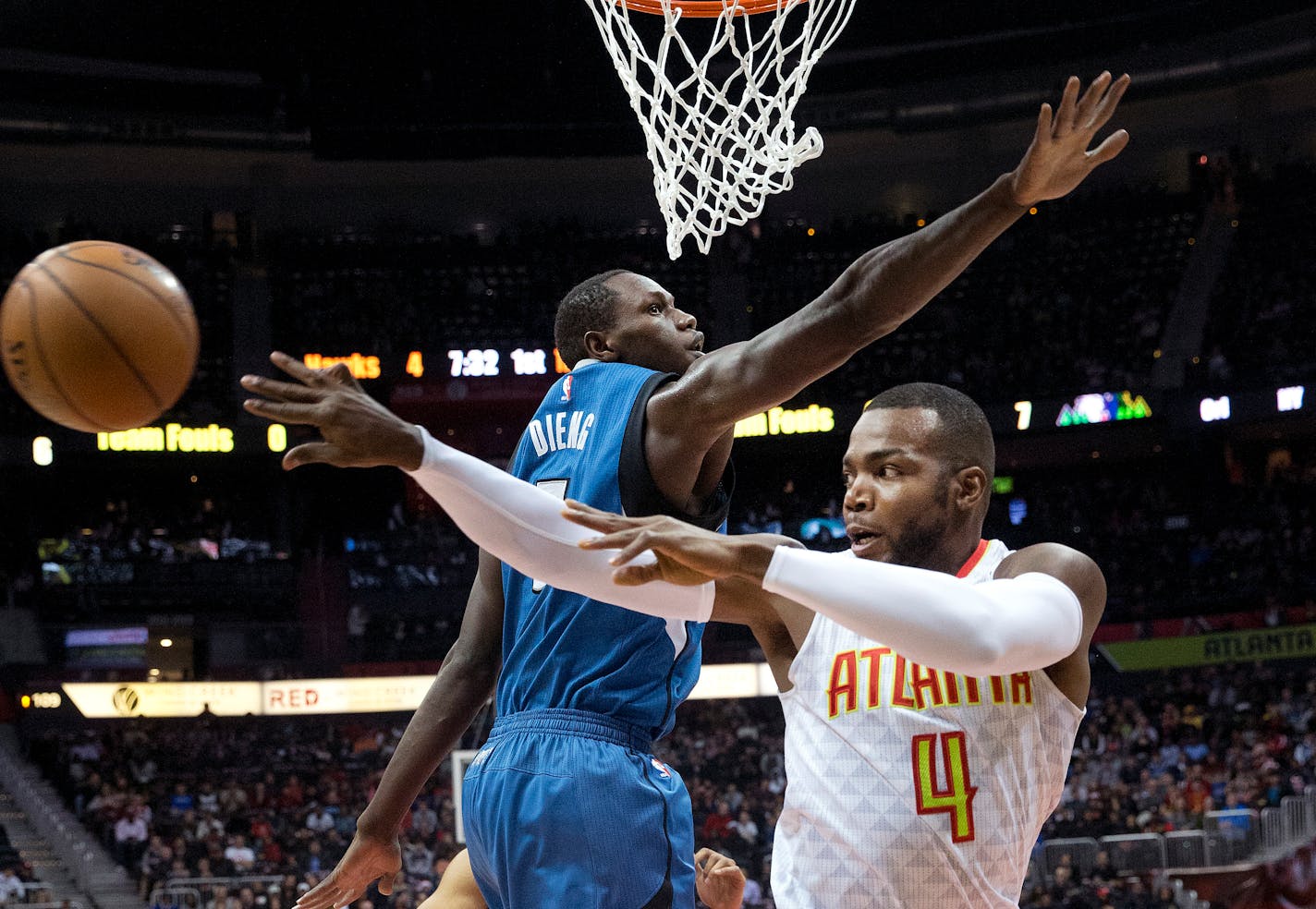 Hawks forward Paul Millsap passed around Timberwolves forward Gorgui Dieng in the first half of Minnesota's 92-84 victory on Wednesday night.