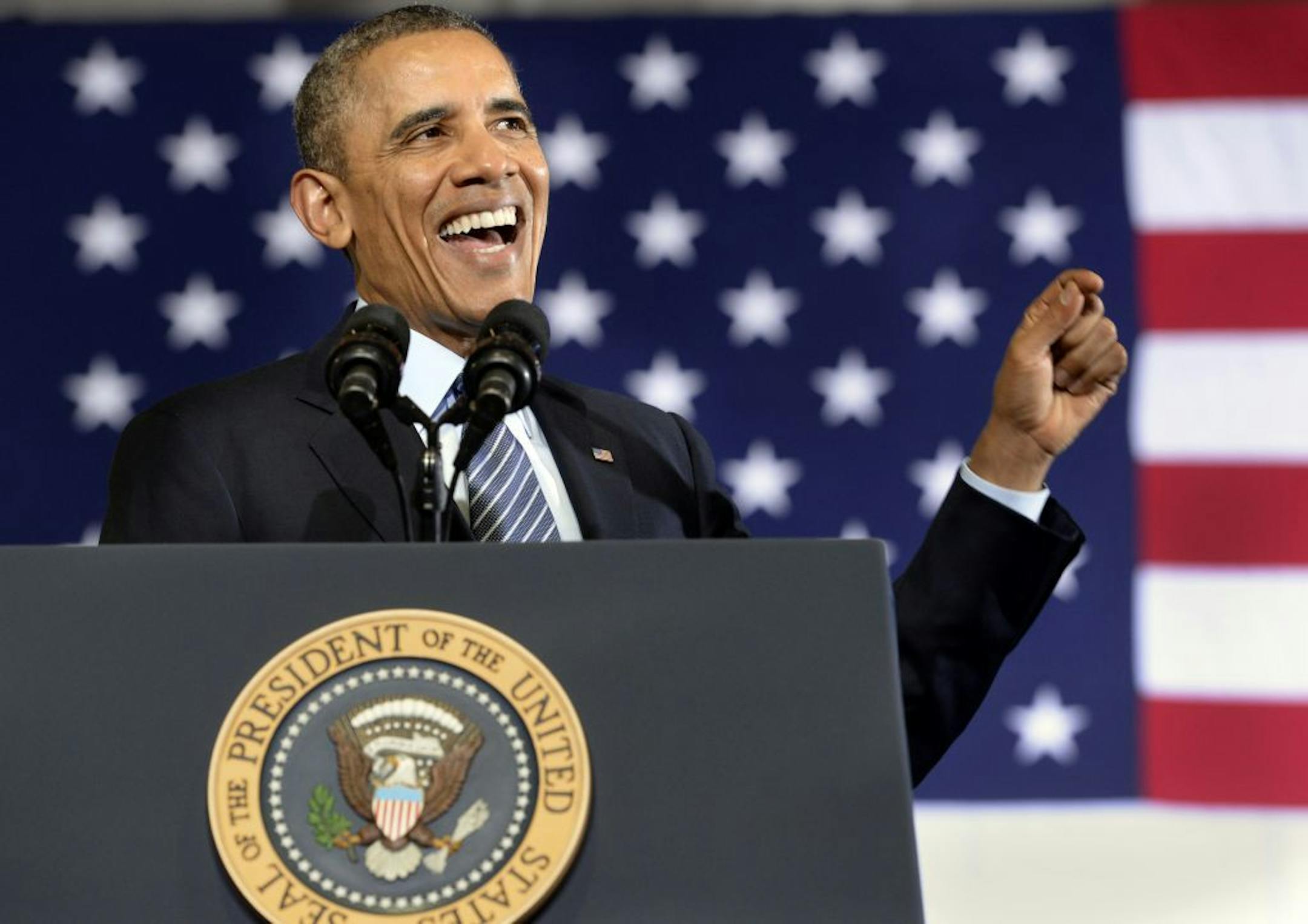 President Barack Obama speaks about the farm bill, Friday, Feb. 7, 2014, at Michigan State University in East Lansing, Mich. The president planned to sign the farm bill at Michigan State University, choosing middle America for a rare celebration of Washington political compromise.