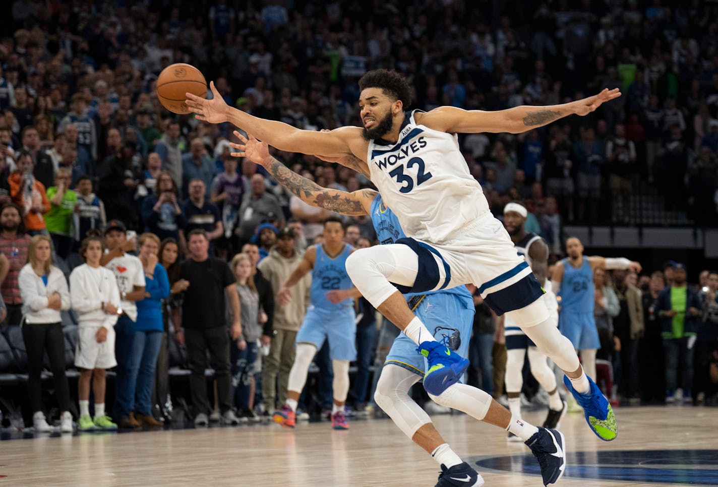 Minnesota Timberwolves center Karl-Anthony Towns (32) nearly intercepted the inbounds pass to Memphis Grizzlies forward Brandon Clarke (15) with seconds left in the fourth quarter Saturday night, April 23, 2022 at Target Center in Minneapolis. The Minnesota Timberwolves defeated the Memphis Grizzlies 119-118 in game 4 of their NBA first round playoff series. ] JEFF WHEELER • Jeff.Wheeler@startribune.com