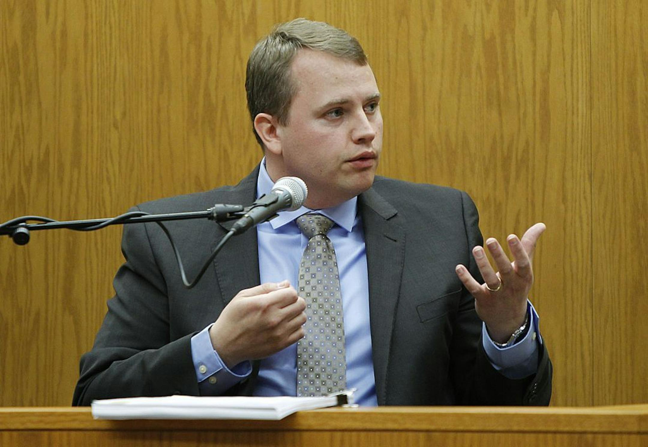 Dr. Erik Knudson, a witness for the prosecution, described how Aaron Schaffhausen used a knife to kill his daughters, during the 10th day of trial at a St. Croix County Courtroom in Hudson, Wis., Monday, April 15, 2013.