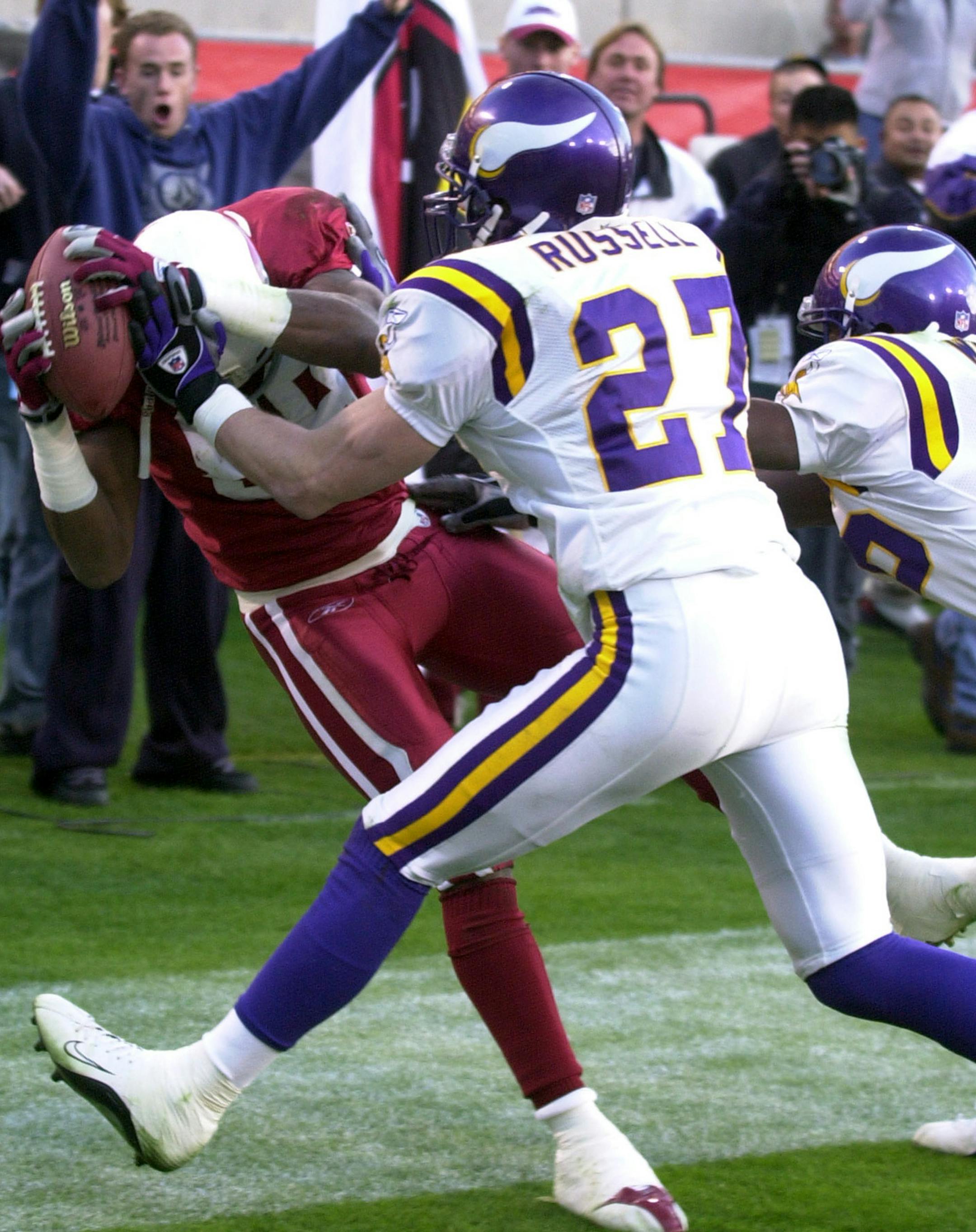 Arizona Cardinals receiver Nate Poole (84) catches a touchdown pass against the Minnesota Vikings during an NFL football game, Sunday, Dec. 28, 2003, in Phoenix, Ariz. (AP Photo/Paul Connors) ORG XMIT: PNP119