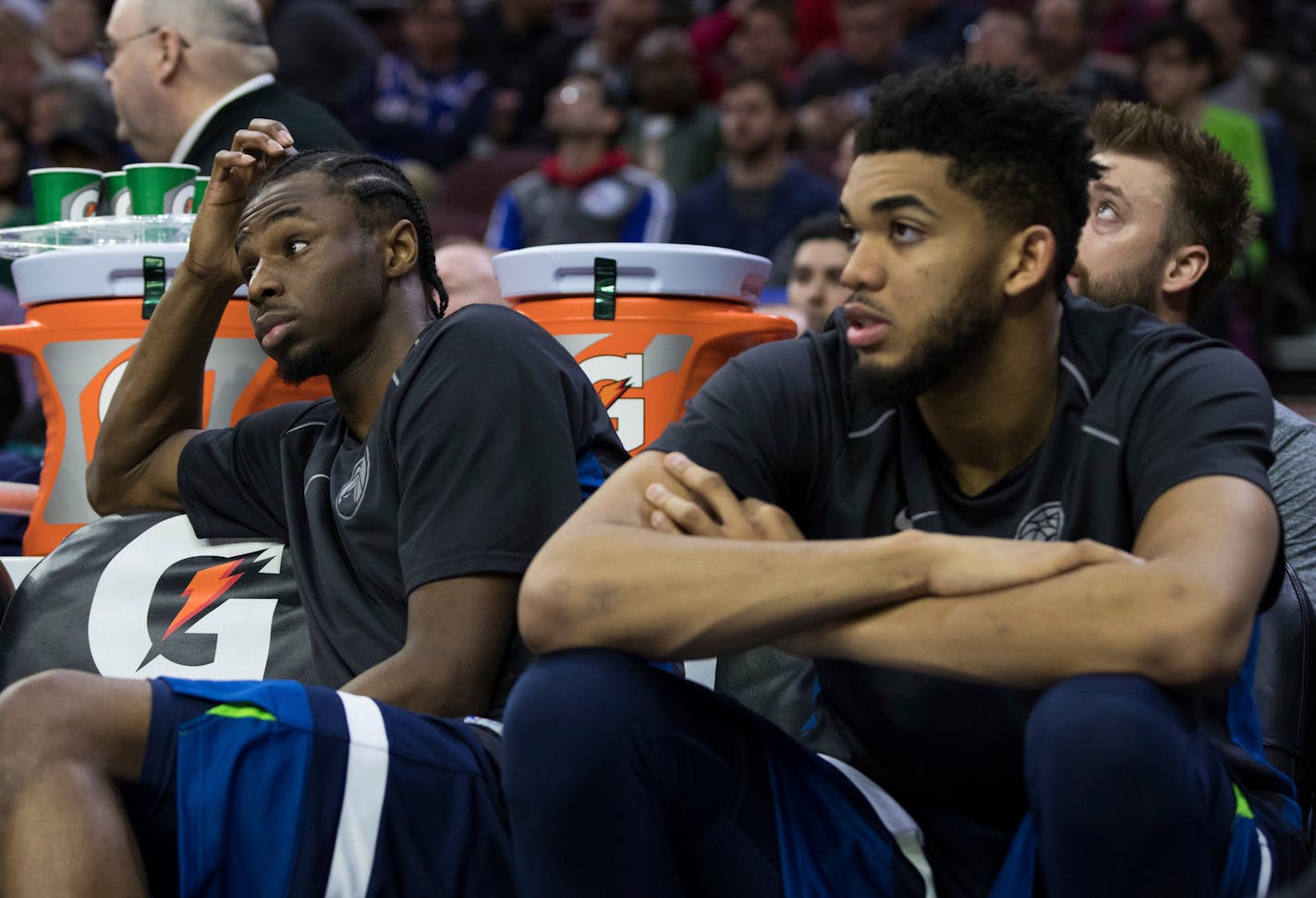 Minnesota Timberwolves' Andrew Wiggins, left, and Karl-Anthony Towns, right, sit on the bench during the second half of the team's NBA basketball game against the Philadelphia 76ers, Saturday, March 24, 2018, in Philadelphia. The 76ers won 120-108. (AP Photo/Chris Szagola)