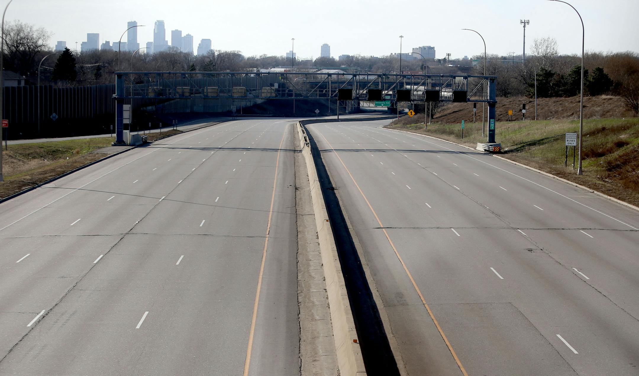 A long, empty stretch of Interstate 94 as seen from the Vandalia/Cretin Avenue Bridge in St. Paul looking west toward Minneapolis.