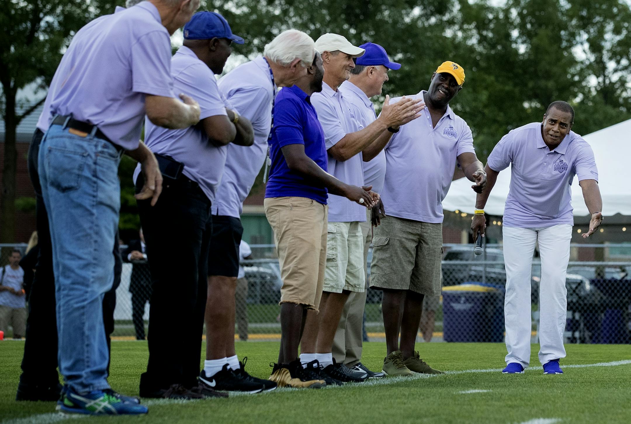 Ahmad Rashad bowed to other former Minnesota Vikings were recognized before the scrimmage at Blakeslee Stadium in Mankato.