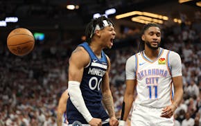 Timberwolves guard Terrence Shannon Jr. celebrates a score as Oklahoma City Thunder guard Isaiah Joe looks on in the fourth quarter at Target Center.