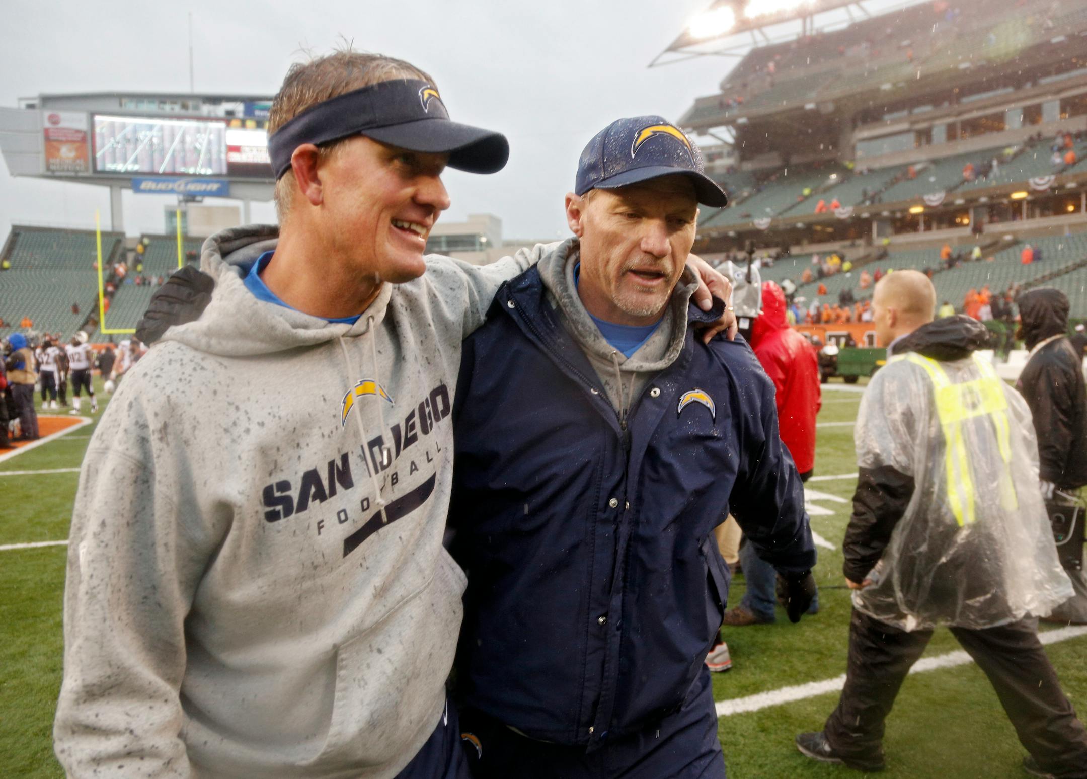 San Diego offensive coordinator Ken Whisenhunt, right, has been hired to be the Tennessee Titans' new head coach.