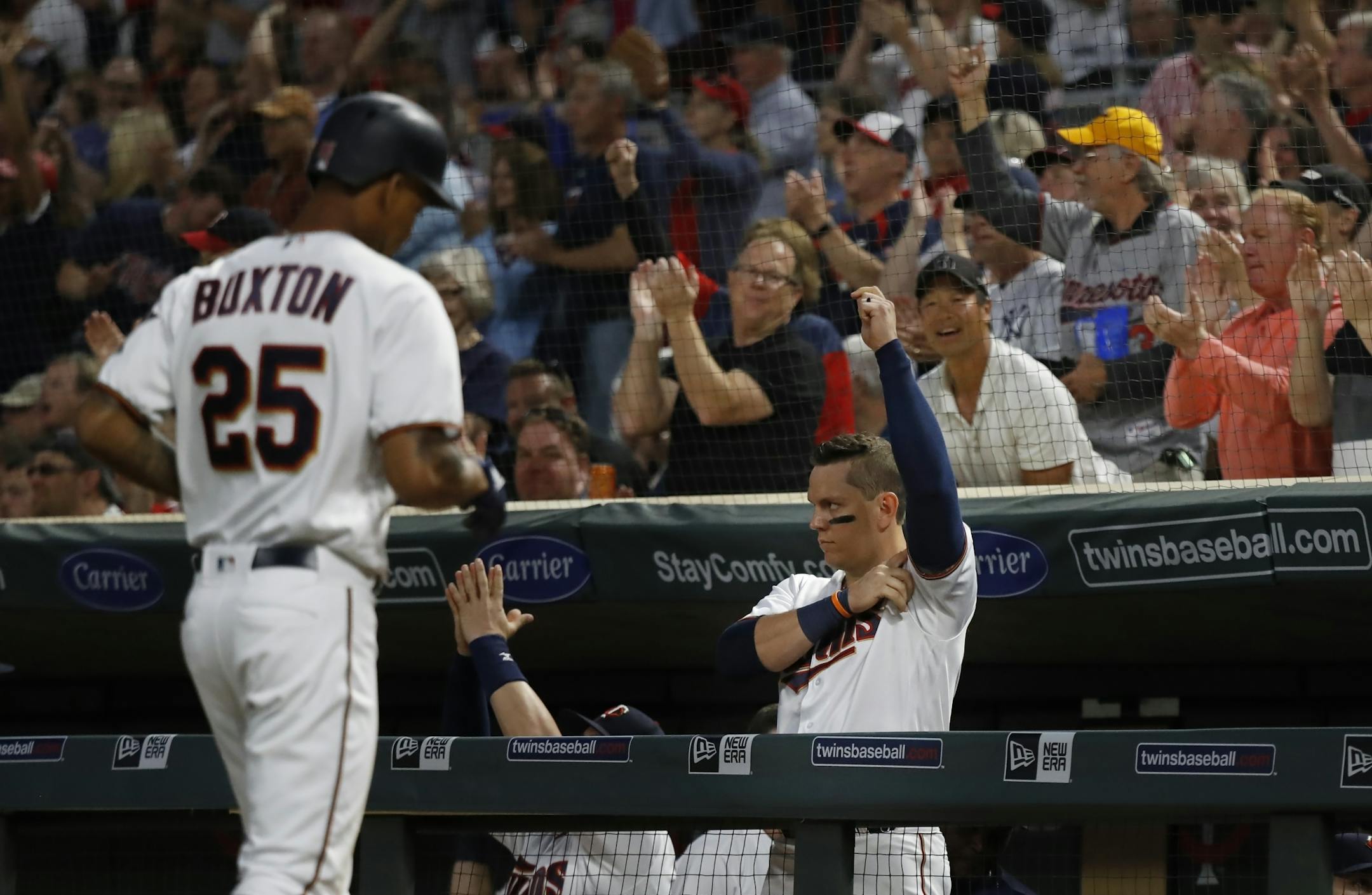 Byron Buxton(25) comes in to score in the 5th inning giving the Twins a 3-0 lead.