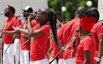 The musical group “Sounds of Blackness” performed during a gathering to celebrate Juneteenth on Saturday at the State Capitol.
