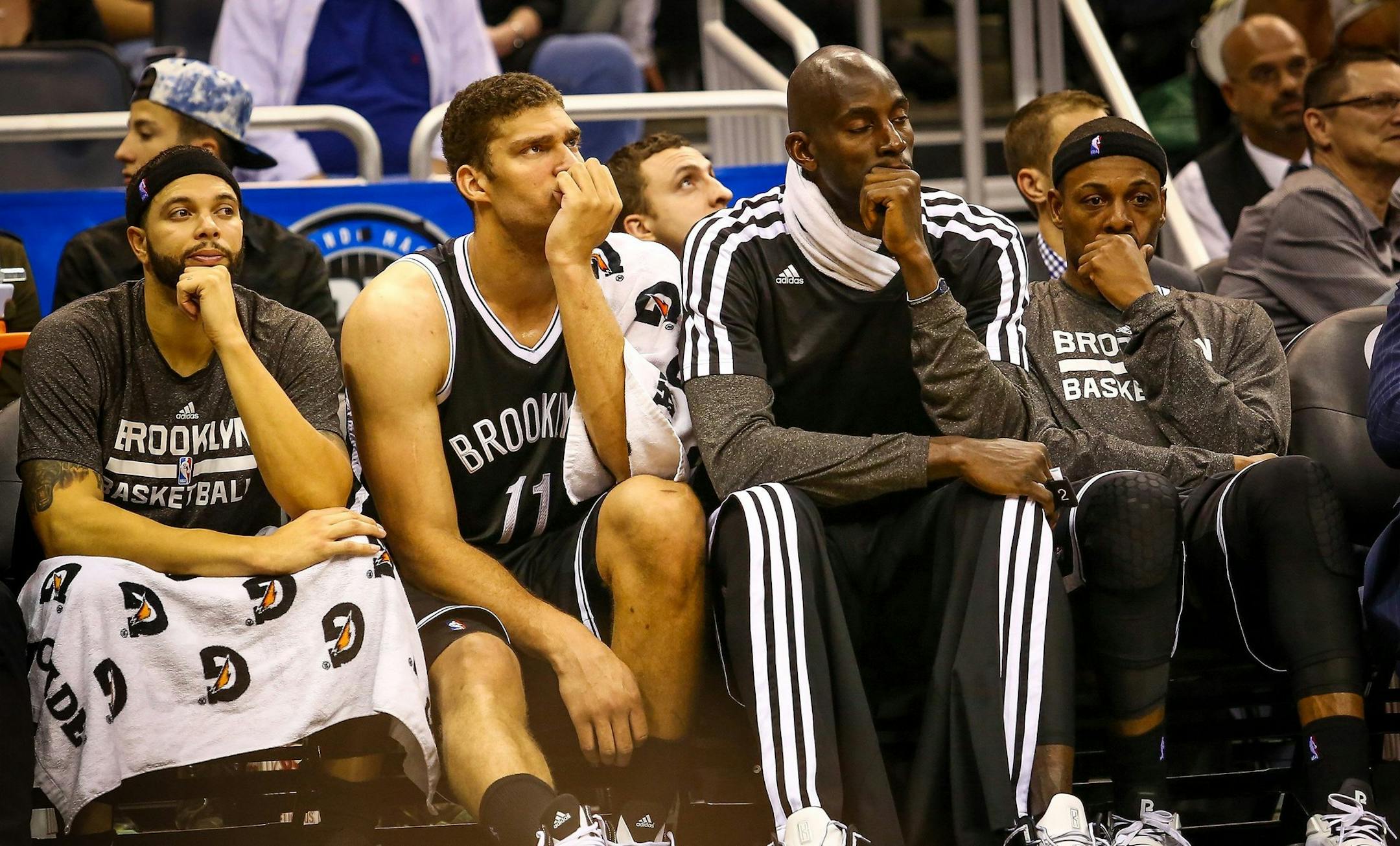 Brooklyn Nets players Deron Williams (8), Brook Lopez (11), Kevin Garnett (2), and Paul Pierce (34) react as the are defeated by the Orlando Magic, 107-86, at the Amway Center in Orlando, Flornida, Sunday, November 3, 2013. (Joshua C. Cruey/Orlando Sentinel/MCT) ORG XMIT: 1145154 ORG XMIT: MIN1311032023357148
