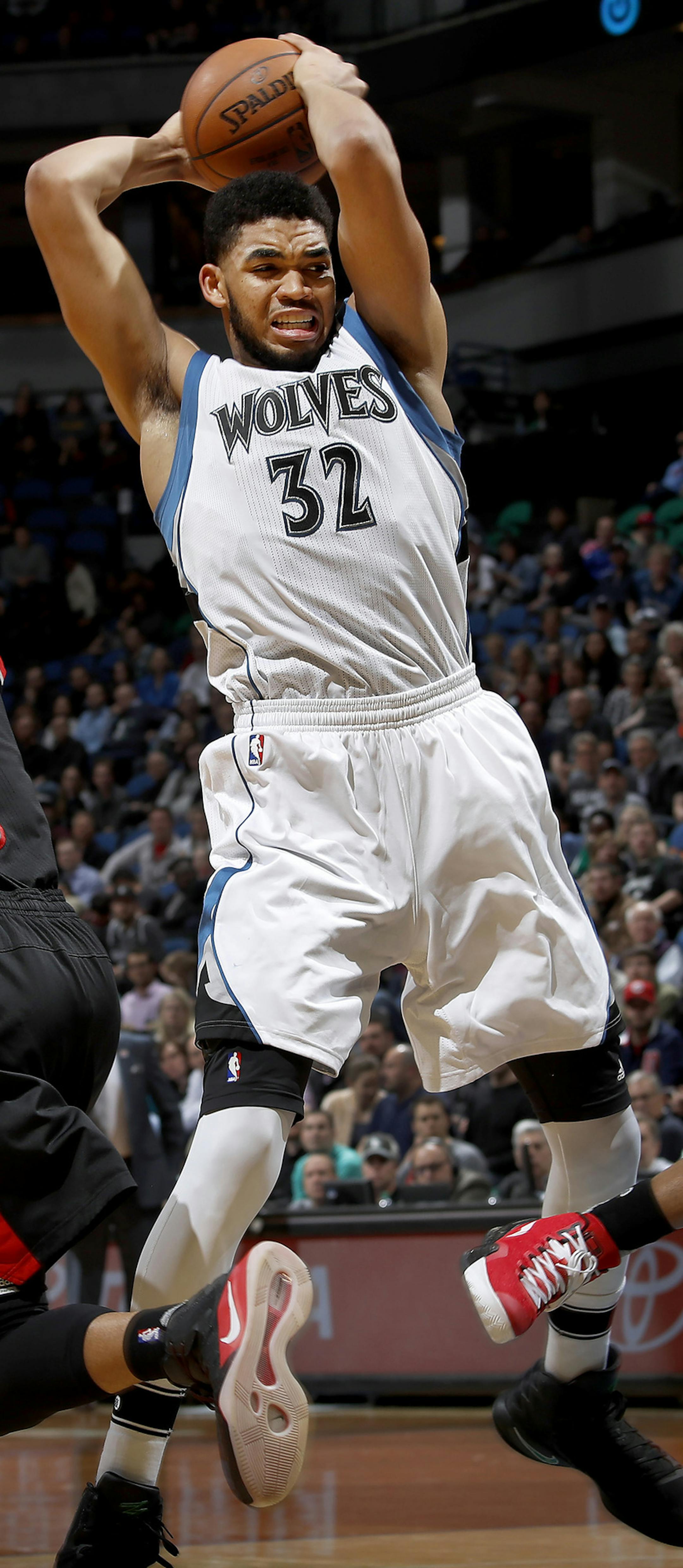 Minnesota Timberwolves' Karl-Anthony Towns (32) grabs a rebound in the fourth quarter against the Portland Trail Blazers on Monday, April 3, 2017 at Target Center in Minneapolis, Minn. (Carlos Gonzalez/Minneapolis Star Tribune/TNS) ORG XMIT: 1200037