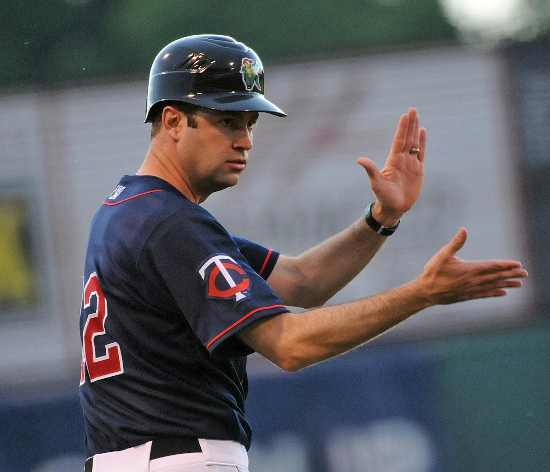 The Kernels snapped a six-game losing streak defeating the Clinton LumberKings at Perfect Game Field at Veterans Memorial Stadium on Tuesday night May 28,2013. Jake Mauer Manager of the Cedar Rapids Kernels also doubles as third base coach.] Richard.Sennott@startribune.com Richard Sennott/Star Tribune. , Cedar Rapids Iowa Tuesday 5/28/13) ** (cq) ORG XMIT: MIN1305300831330385