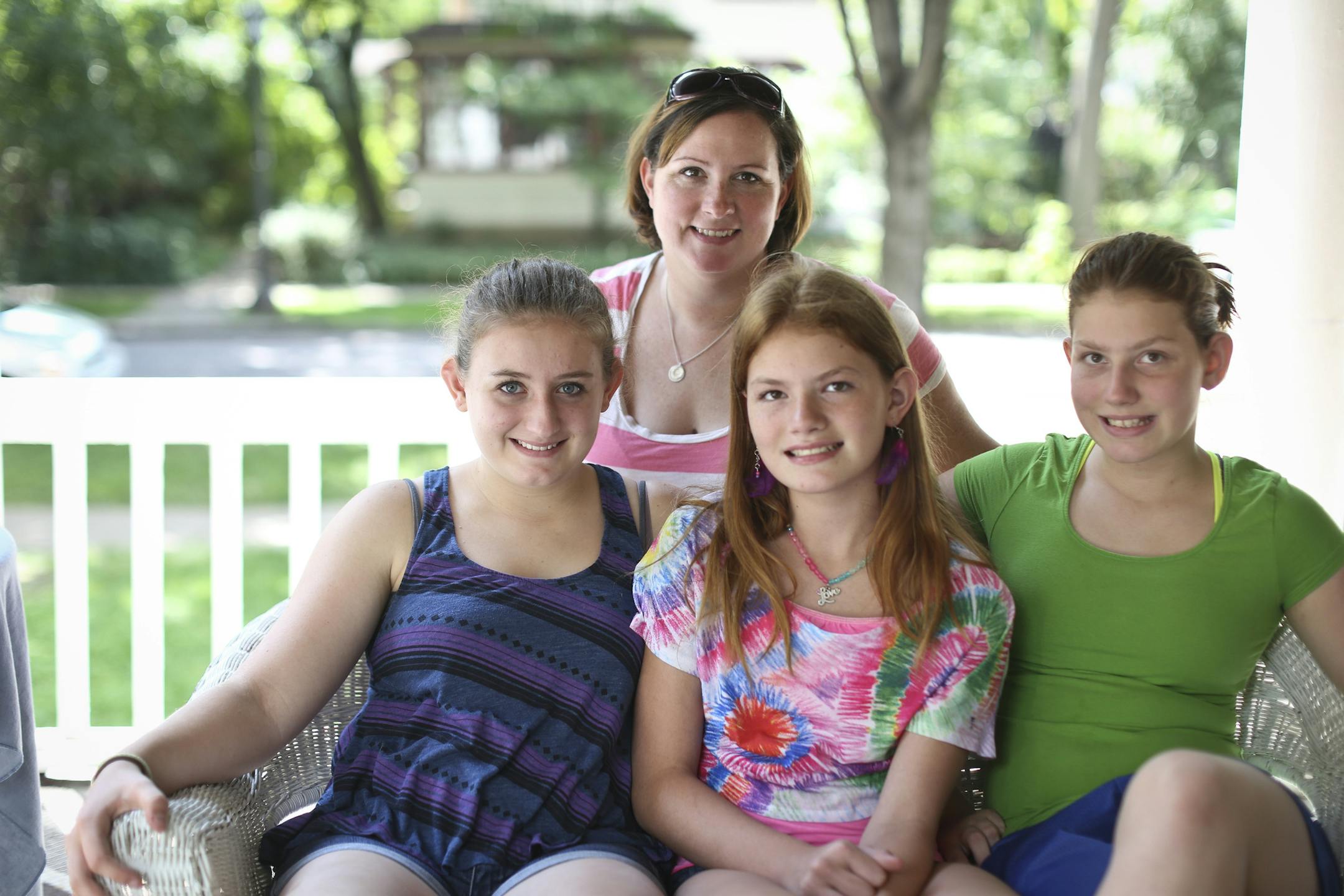 Emily Leabch, back, with her three daughters, from left, Ellie, 15, Shannon, 12, and Katie, 13, photographed at home in St. Paul, Minn. on Friday, August 16, 2013. ] (RENEE JONES SCHNEIDER ‚Ä¢ reneejones@startribune.com)