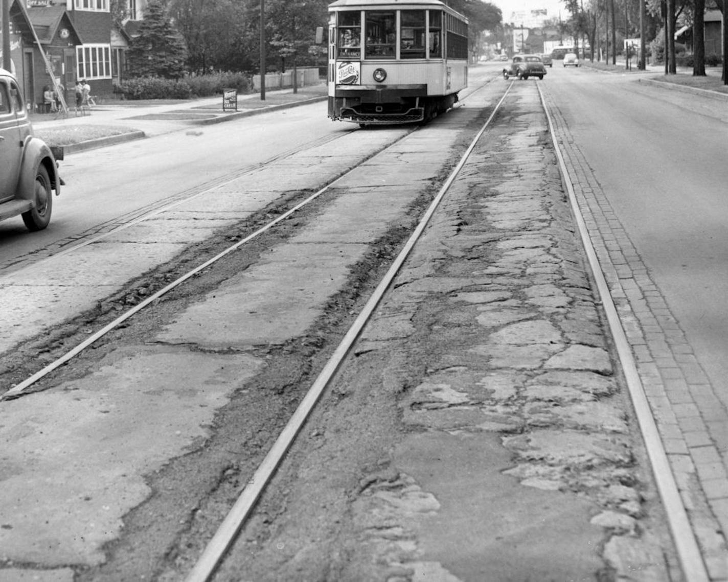 Streetcar on Minnehaha Avenue, St. Paul, 1951, Twin City Rapid Transit Co. Accompanying news item (Minneapolis Tribune, June 20, 1951) discusses condition of pavement between the tracks. File photo.