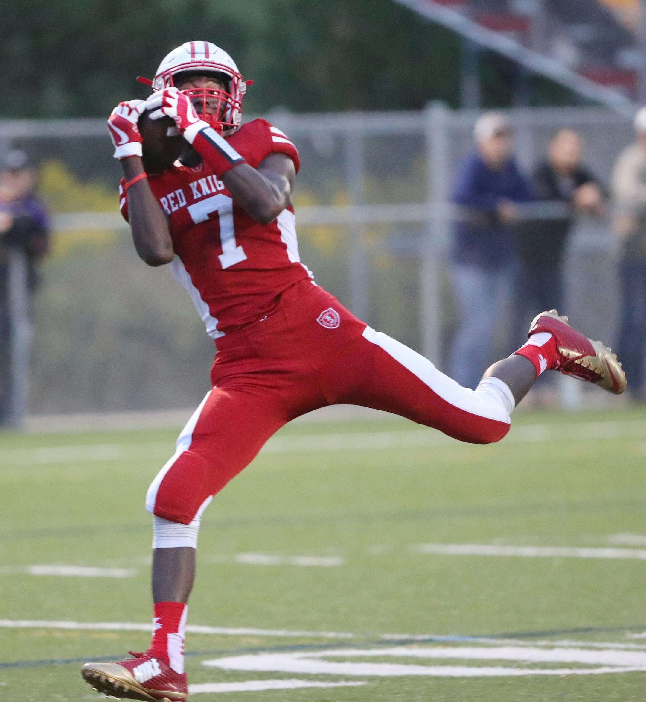 Benilde-St. Margaret's receiver Gabe Alada (7) hauls in a long 1st half TD reception against Waconia Friday, Sept. 1, 2017 at BSM High, in St. Louis Park, MN.]
DAVID JOLES ï david.joles@startribune.com Waconia at Benilde-St. Margaret's