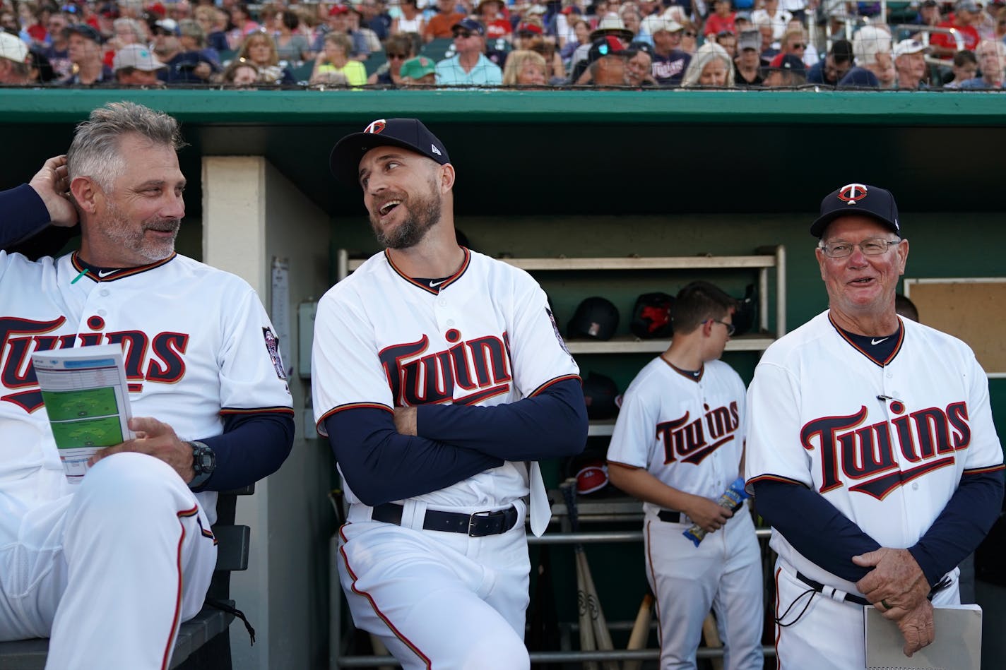 Minnesota Twins manager Rocco Baldelli (5) and Minnesota Twins bench coach Derek Shelton (9) joked with each other before Saturday's game. ] ANTHONY SOUFFLE • anthony.souffle@startribune.com The Minnesota Twins played the Tampa Bay Rays in their first home Spring Training game Saturday, Feb. 23, 2019 at The CenturyLink Sports Complex's Hammond Stadium in Fort Myers, Fla.