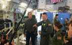 Bob Woodruff talks with a Critical Care Air Transport Team (CCATT) aboard a C-17 at Ramstein Air Base in Germany in "Military Medicine: Beyond the Bat