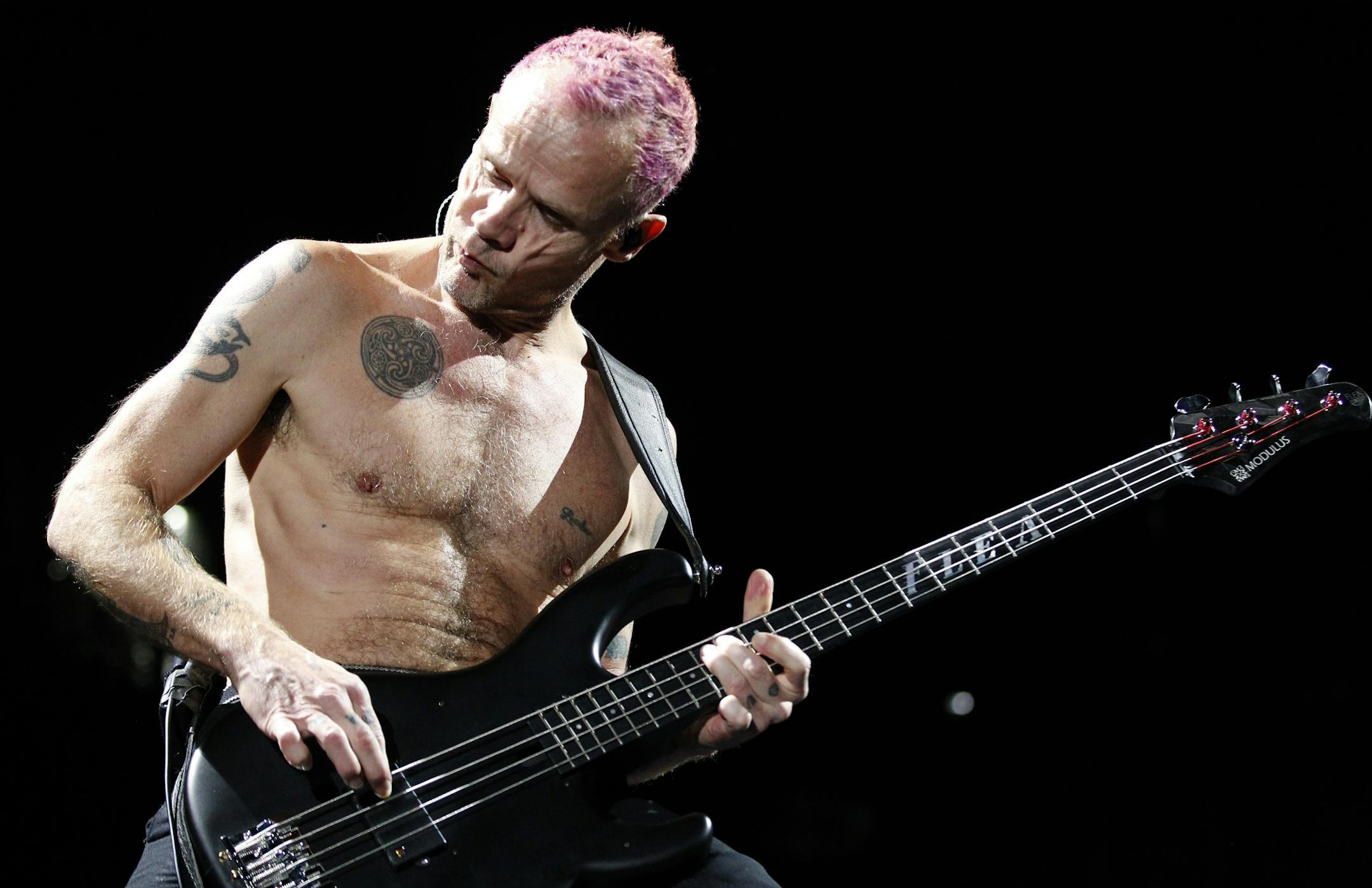 Bassists Flea performed with the Red Hot Chili Peppers at Target Center on Tuesday night.