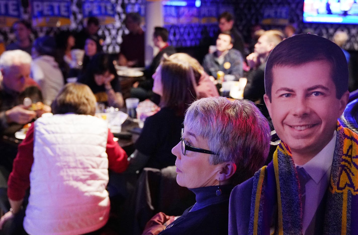 Teresa Manzella of Maplewood stood with a cardboard cutout of presidential candidate Pete Buttiegig as she and other Buttiegig volunteers and supporters gathered to watch the democratic candidates debate on television. ] ANTHONY SOUFFLE &#x2022; anthony.souffle@startribune.com Pete Buttiegig volunteers and supporters gathered to watch the democratic candidates debate on television Friday, Feb. 7, 2020 at the 508 Bar and Restaurant in Minneapolis.