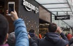 FILE -- The Amazon Go grocery beta launch in Seattle, Dec. 5, 2016. The company is putting its stamp on the city by using it for its expanding array o