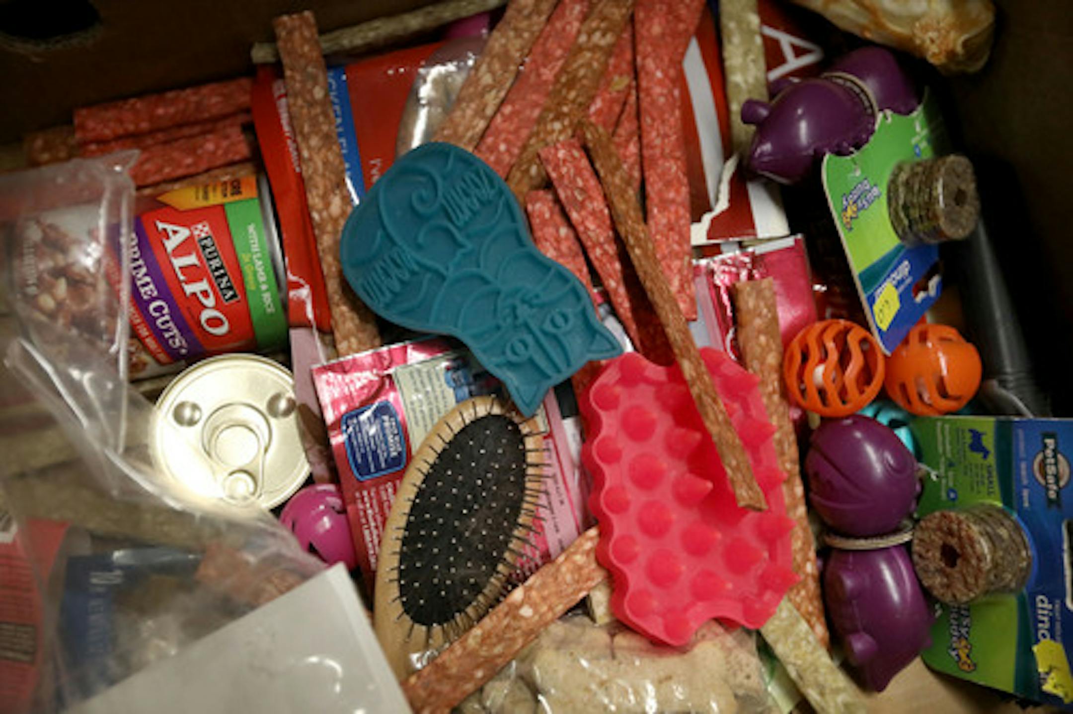Food, treats and toys for animals at Ani-Meals on Wheels where volunteers prepared meals for delivery at Community Emergency Services Saturday, Nov. 9, 2019, in Minneapolis, MN.]