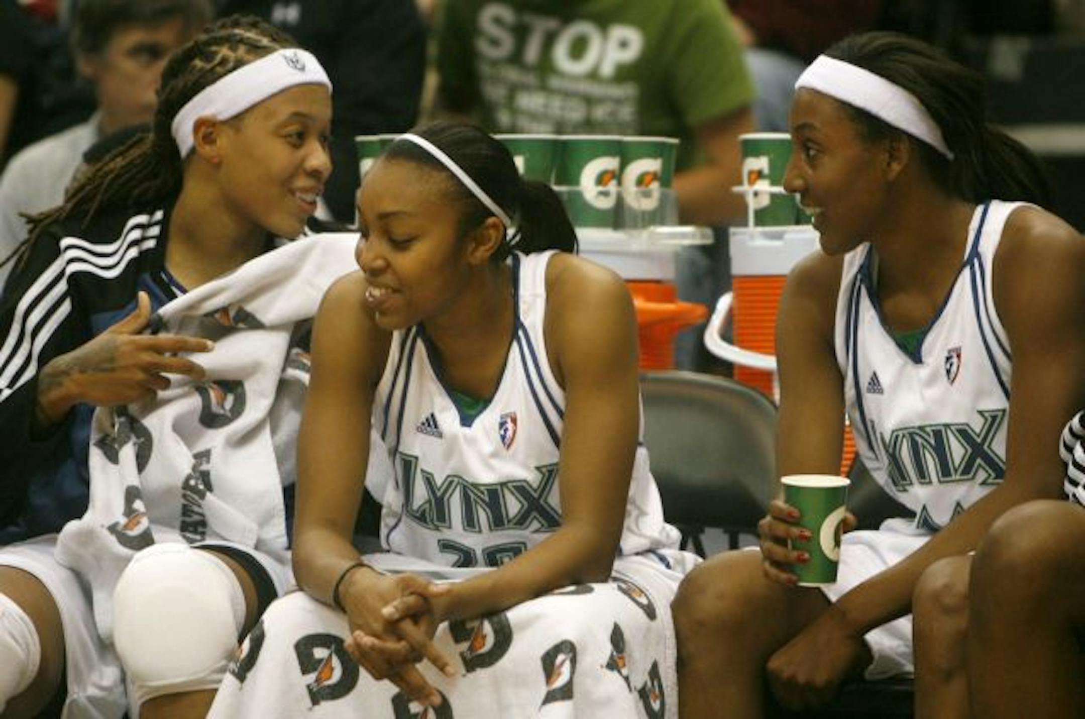 The Lynx will start the season without two of their best players, Seimone Augustus (left) and Candice Wiggins (right). Both have had or are having surgery and will miss training camp and some early games.
