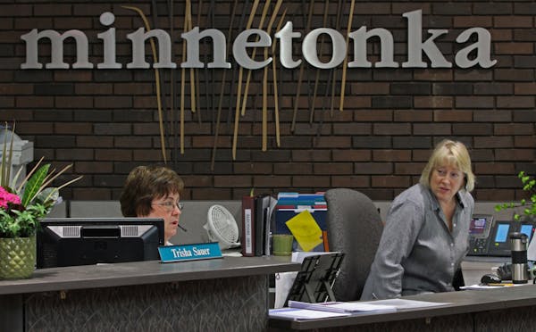 Activity in the reception area of Minnetonka City Hall in 2012.