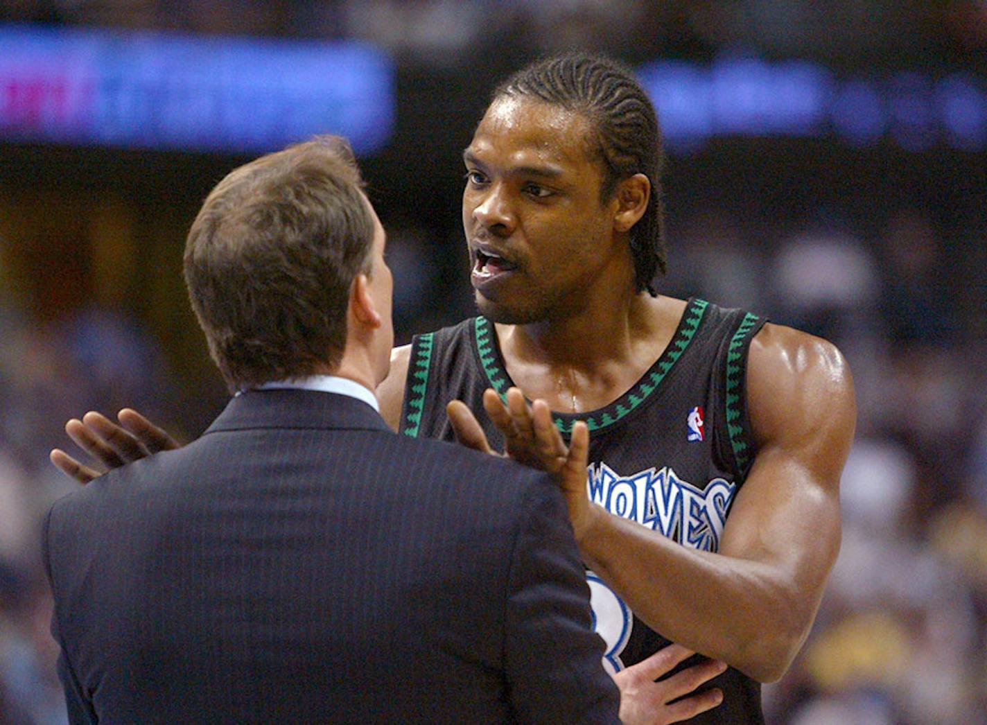 Flip Saunders and former Wolves guard Latrell Sprewell in 2004.