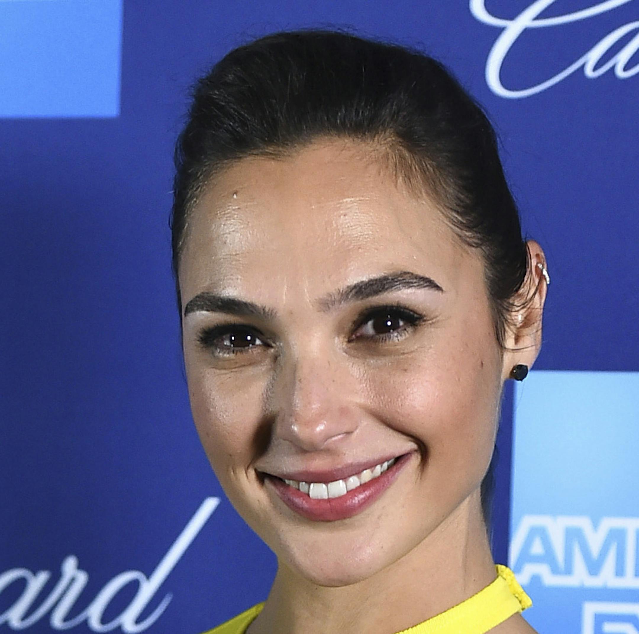 Gal Gadot poses in the press room with the rising star award-actress for "Wonder Woman" at the 29th annual Palm Springs International Film Festival on Tuesday, Jan. 2, 2018, in Palm Springs, Calif. (Photo by Jordan Strauss/Invision/AP)